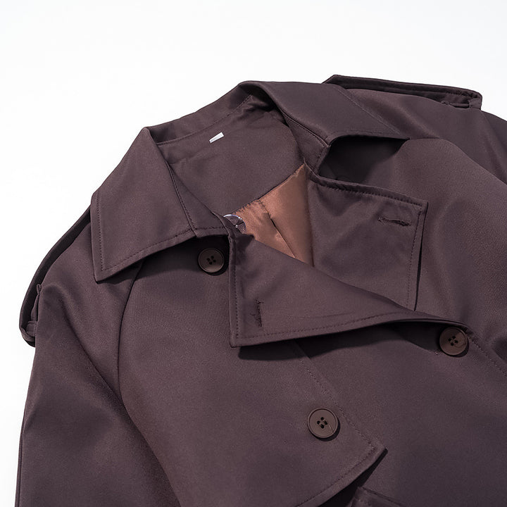 Kvinnors eleganta trench coat med justerbart bälte och trendiga slag Mirla-Eva Jonsson