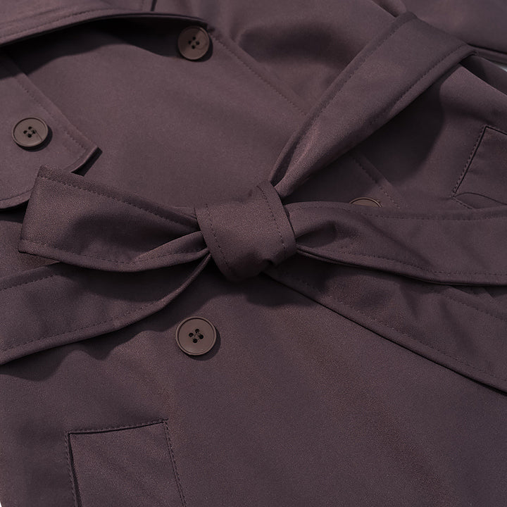 Kvinnors eleganta trench coat med justerbart bälte och trendiga slag Mirla-Eva Jonsson