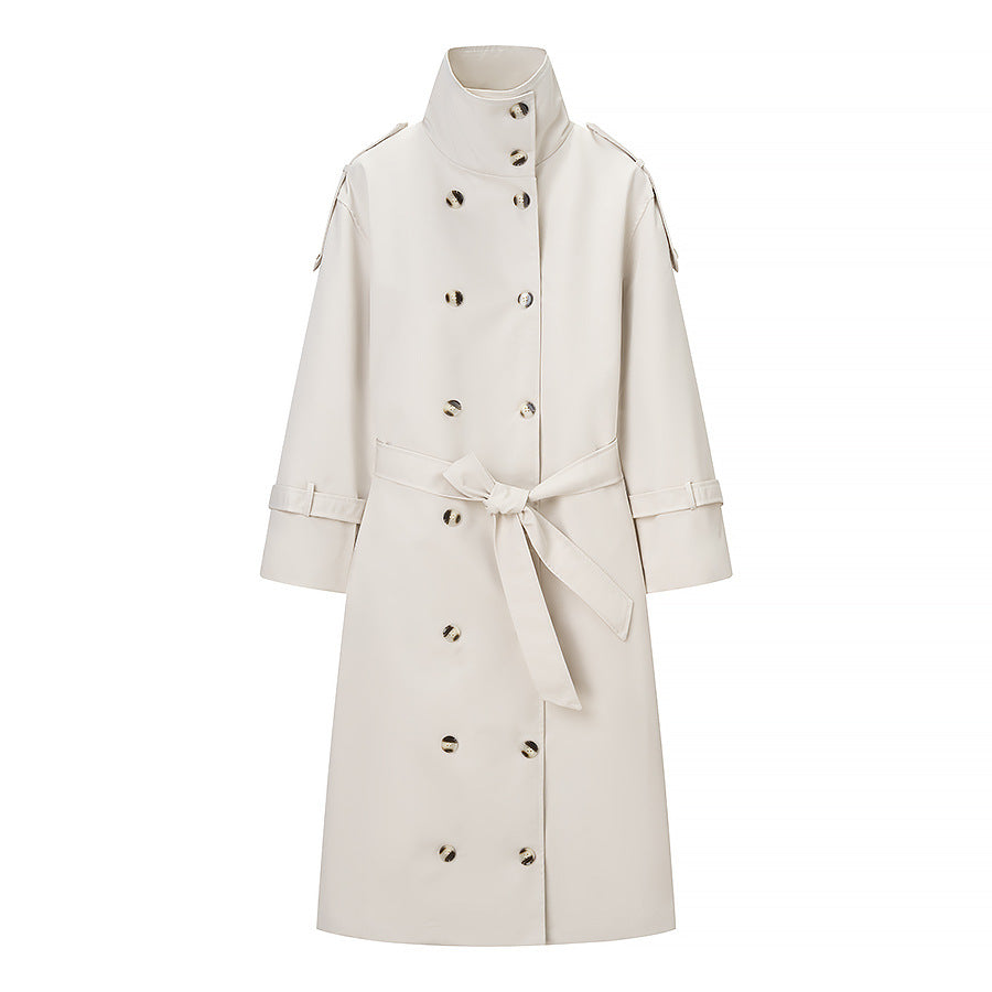 Kvinnors eleganta trenchcoat med breda slag och praktiska fickor Mirla-Eva Jonsson