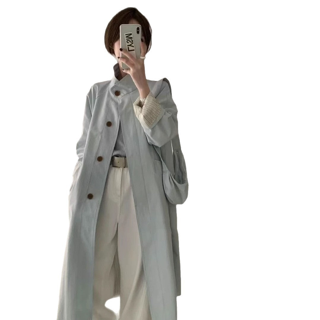 Kvinnors eleganta trenchcoat med knappdetaljer och oversized passform Mirla-Eva Jonsson