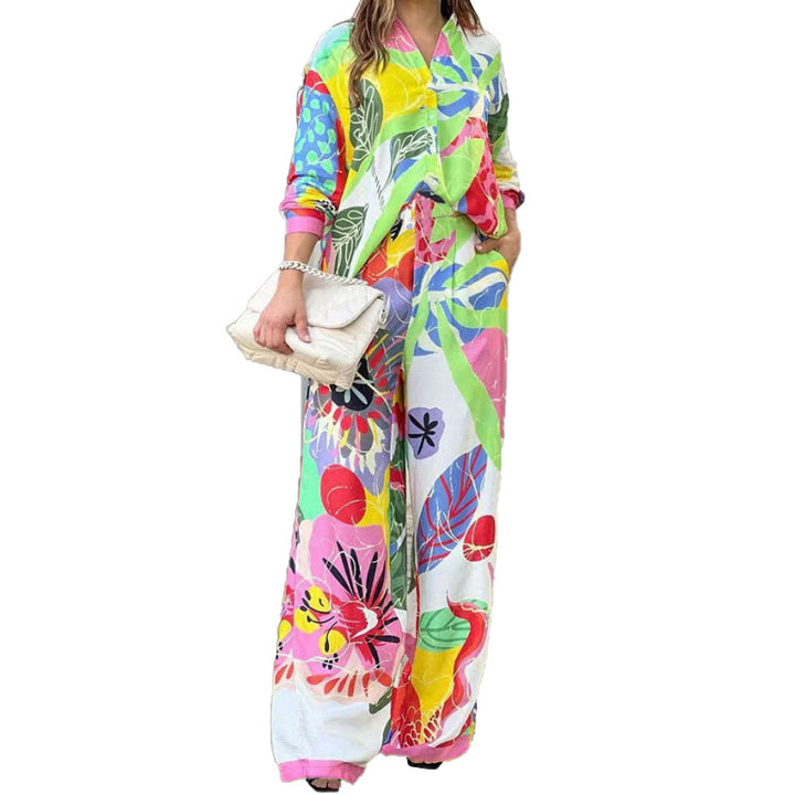 Kvinnors eleganta tvådelade jumpsuit med färgglad blommönster och lös passform Mirla-Eva Jonsson