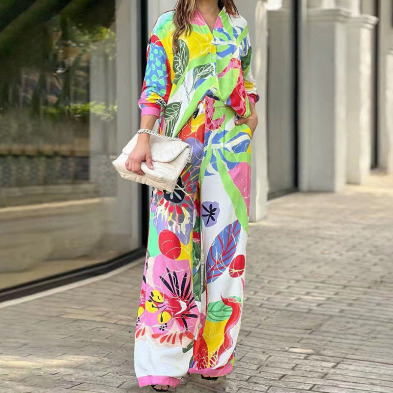 Kvinnors eleganta tvådelade jumpsuit med färgglad blommönster och lös passform Mirla-Eva Jonsson