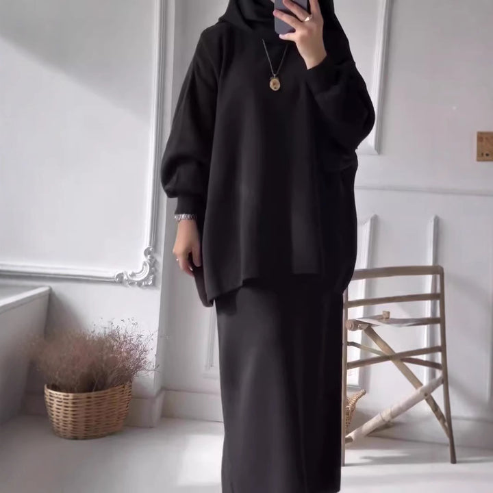 Kvinnors eleganta tvådelade set med asymmetrisk skärning och voluminösa ärmar Mirla-Eva Jonsson