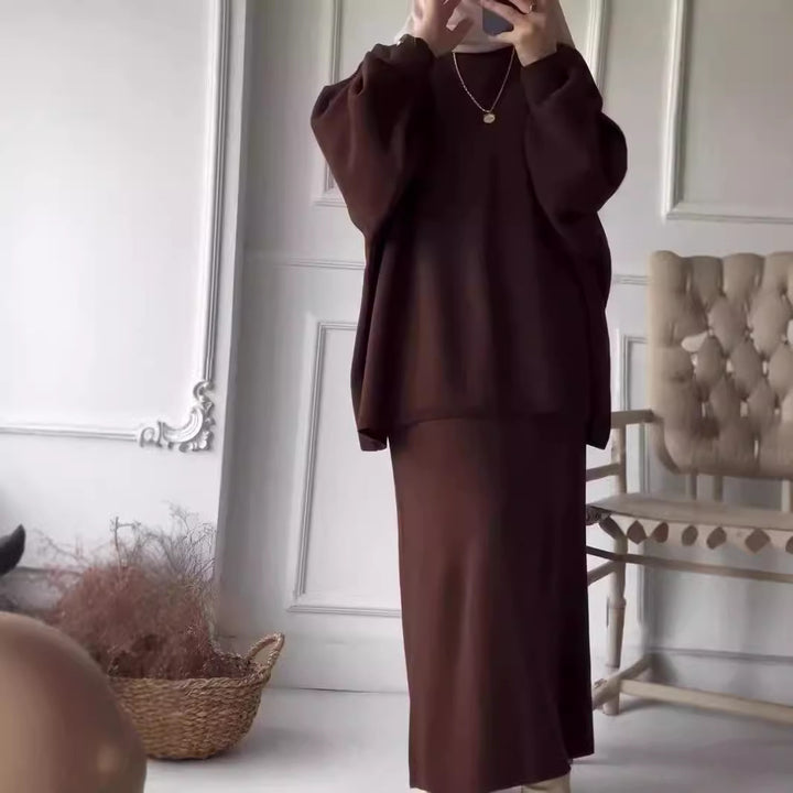 Kvinnors eleganta tvådelade set med asymmetrisk skärning och voluminösa ärmar Mirla-Eva Jonsson