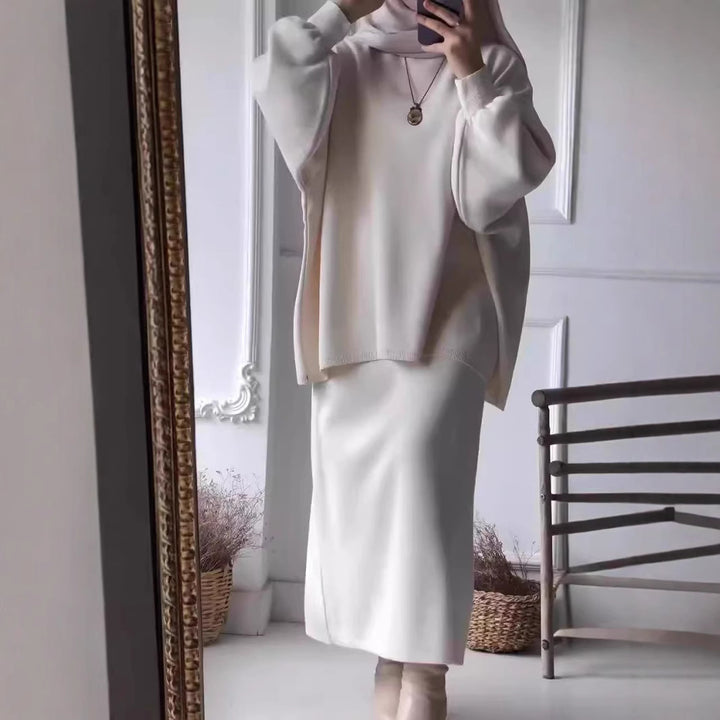 Kvinnors eleganta tvådelade set med asymmetrisk skärning och voluminösa ärmar Mirla-Eva Jonsson