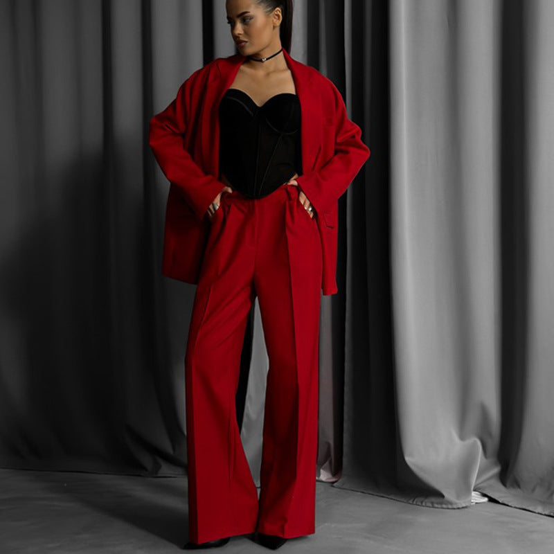 Kvinnors eleganta tvådelade set med oversized blazer och vida byxor Mirla-Eva Jonsson