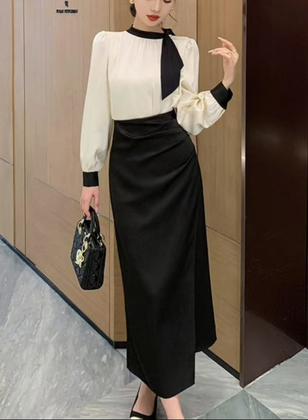 Kvinnors eleganta wrap-klänning med volanger och knutdetalj Mirla-Eva Jonsson