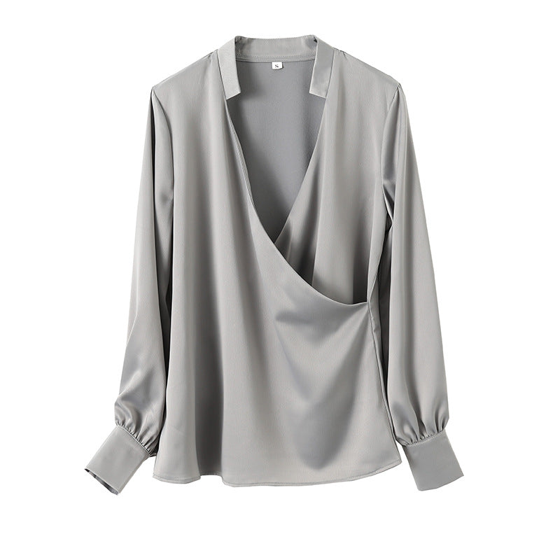 Kvinnors eleganta wrap-top med detaljerad V-hals Mirla-Eva Jonsson