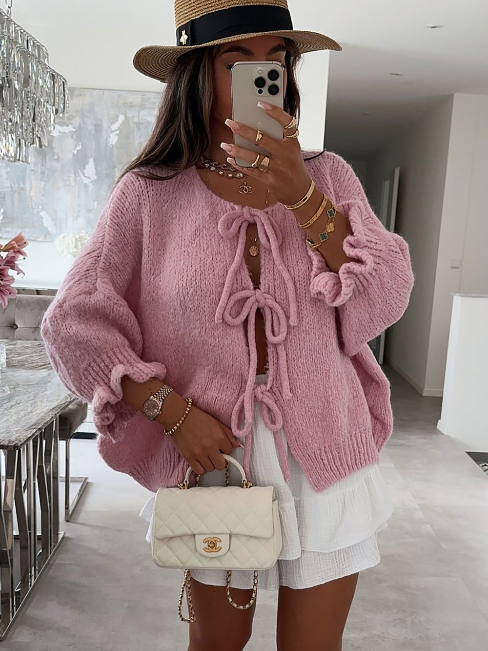 Kvinnors fashionabla cardigan med dekorativ dragsko och luftig passform Mirla-Eva Jonsson