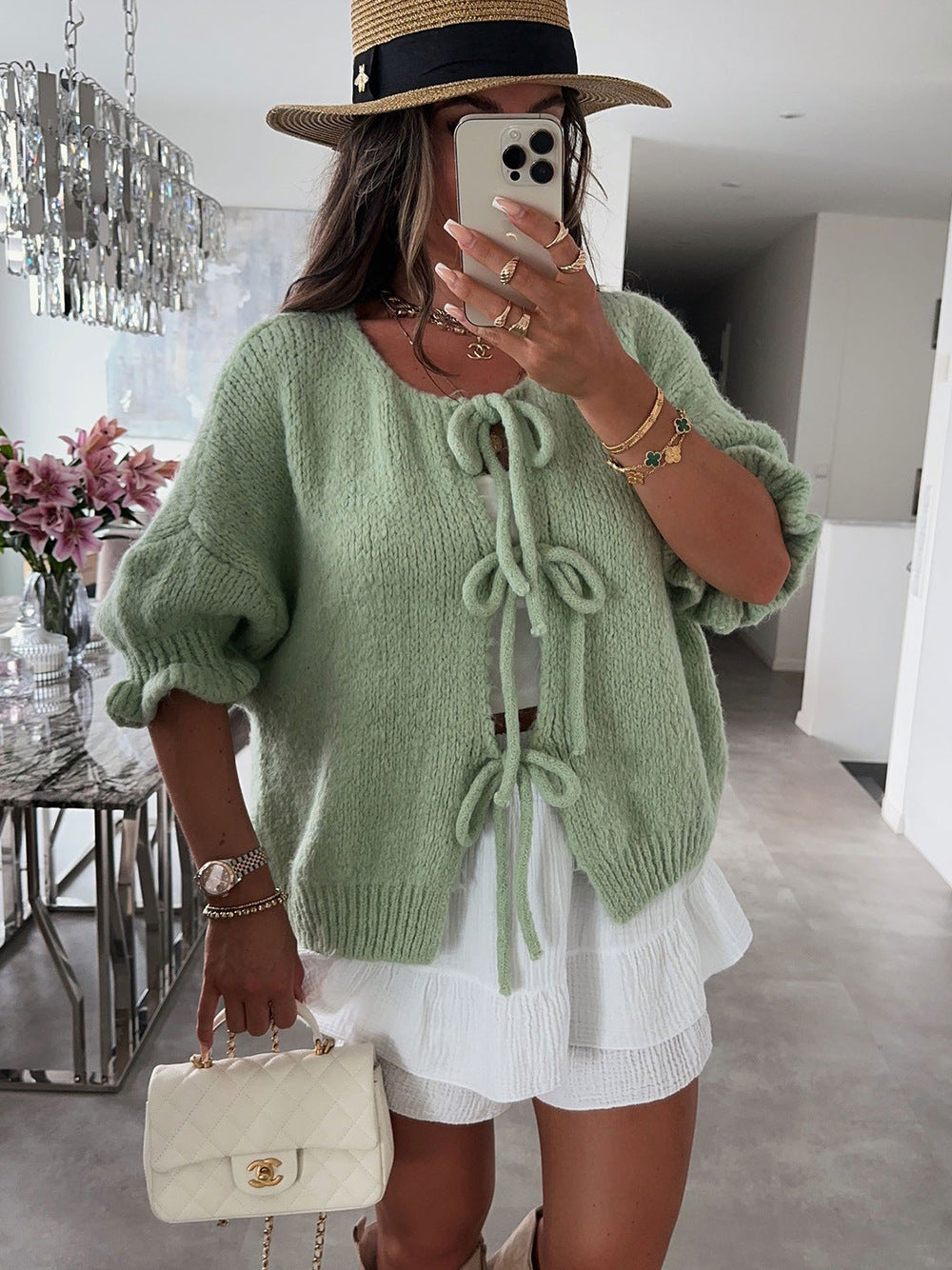 Kvinnors fashionabla cardigan med dekorativ dragsko och luftig passform Mirla-Eva Jonsson