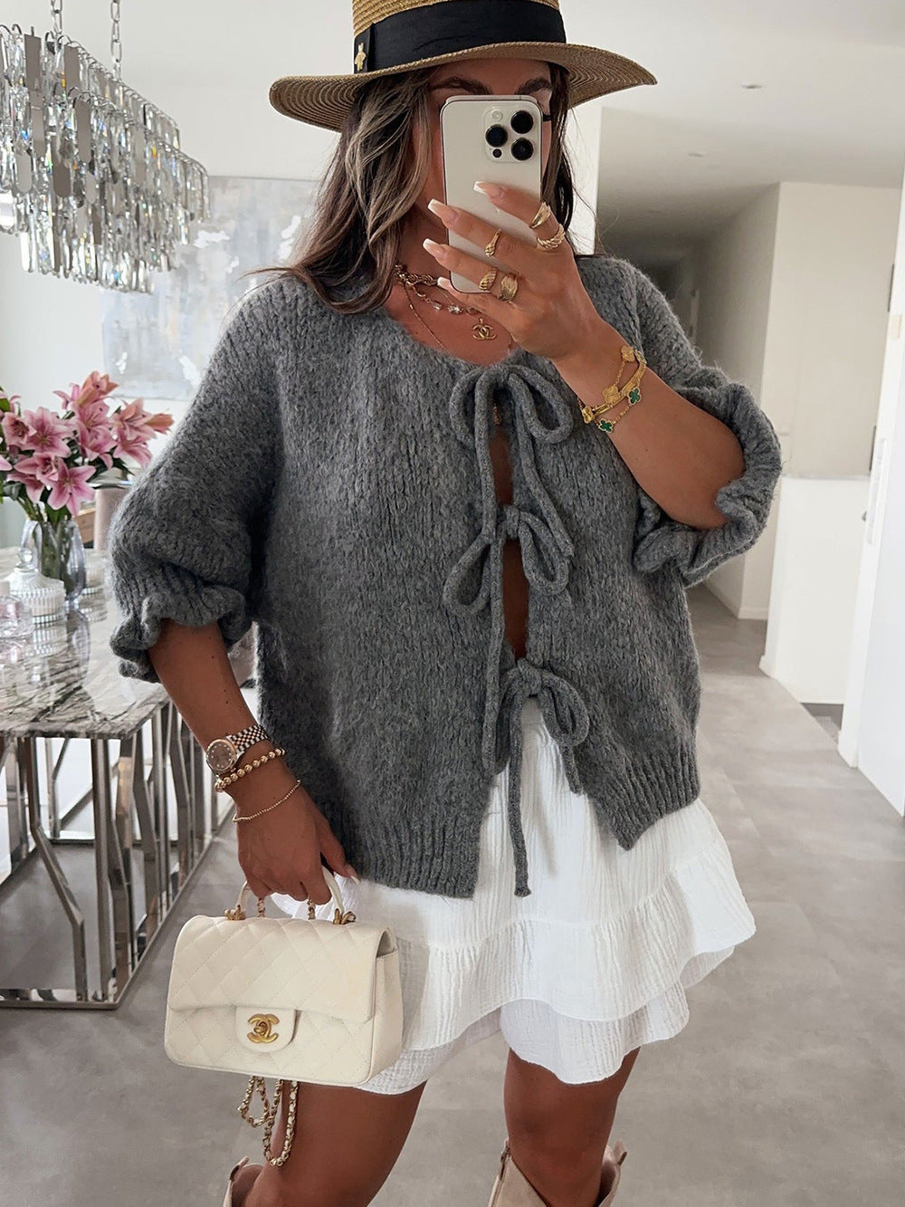 Kvinnors fashionabla cardigan med dekorativ dragsko och luftig passform Mirla-Eva Jonsson