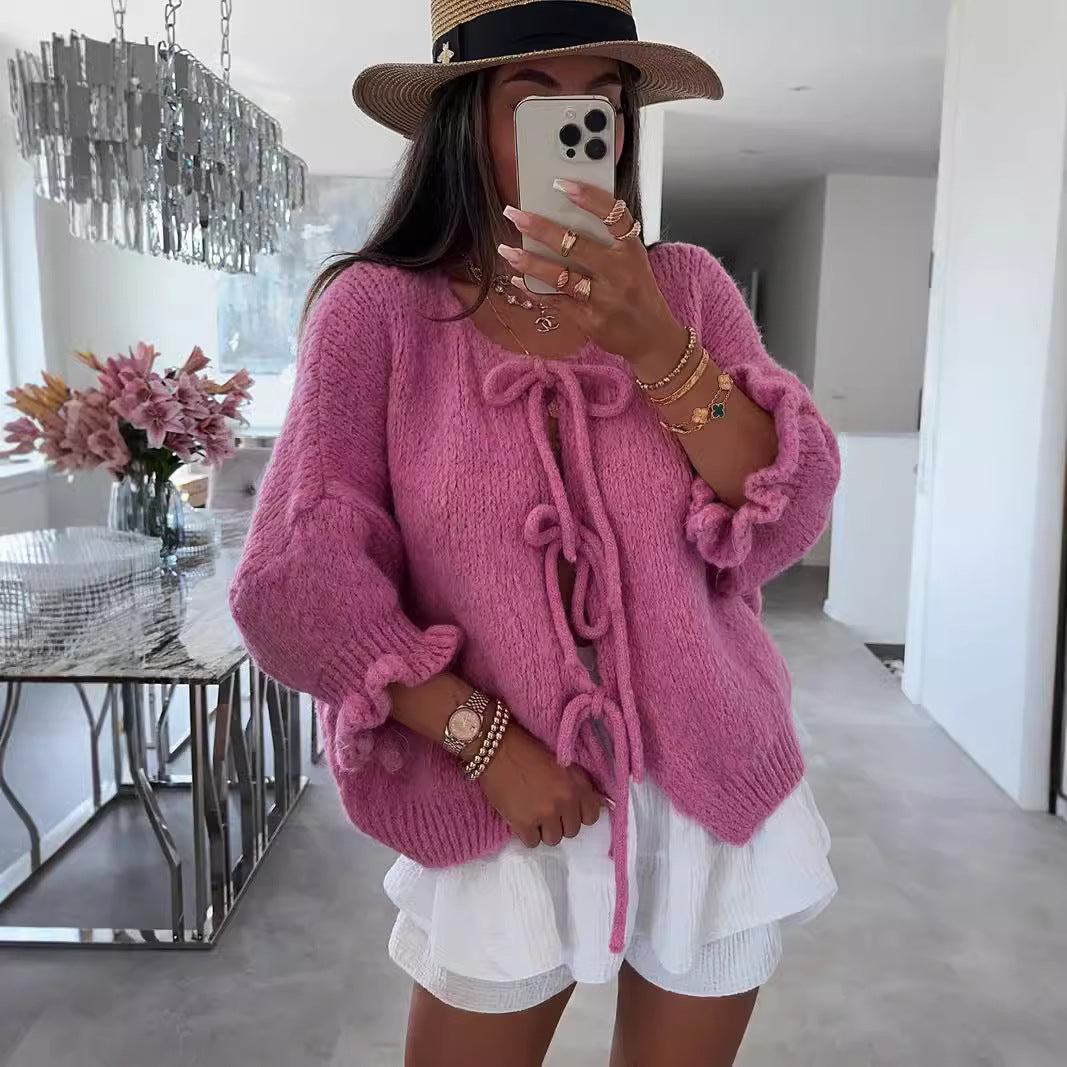 Kvinnors fashionabla cardigan med dekorativ dragsko och luftig passform Mirla-Eva Jonsson