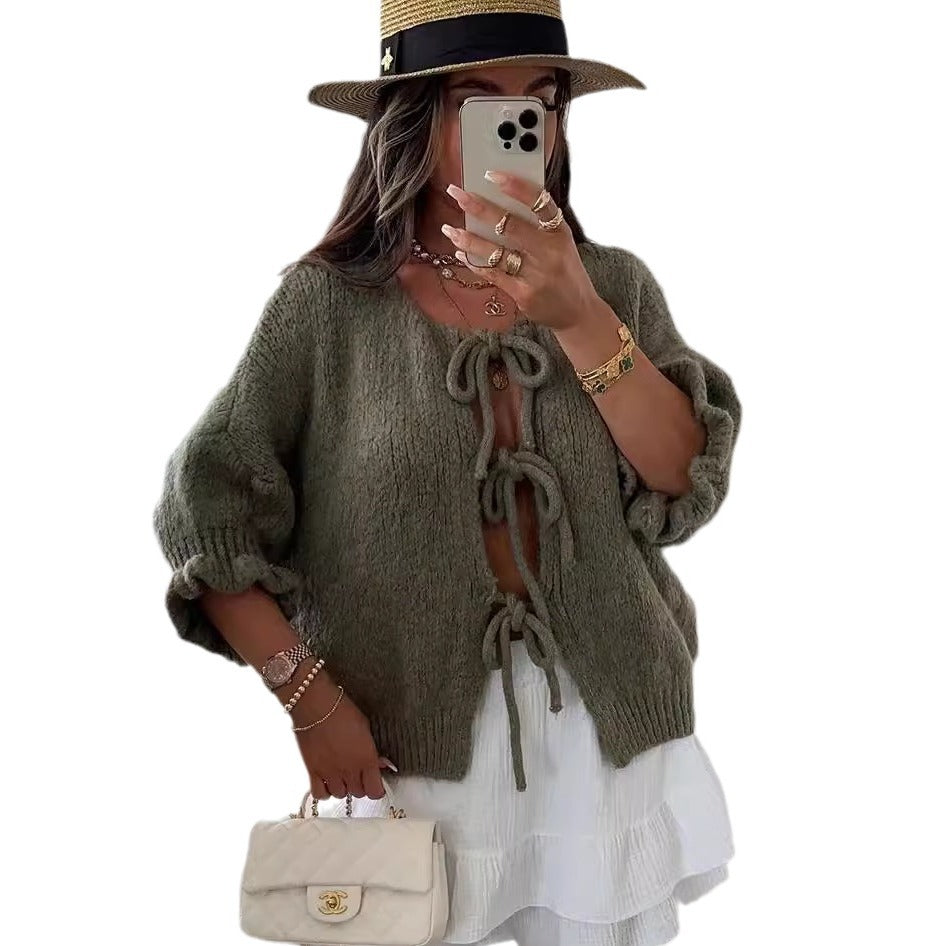 Kvinnors fashionabla cardigan med dekorativ dragsko och luftig passform Mirla-Eva Jonsson