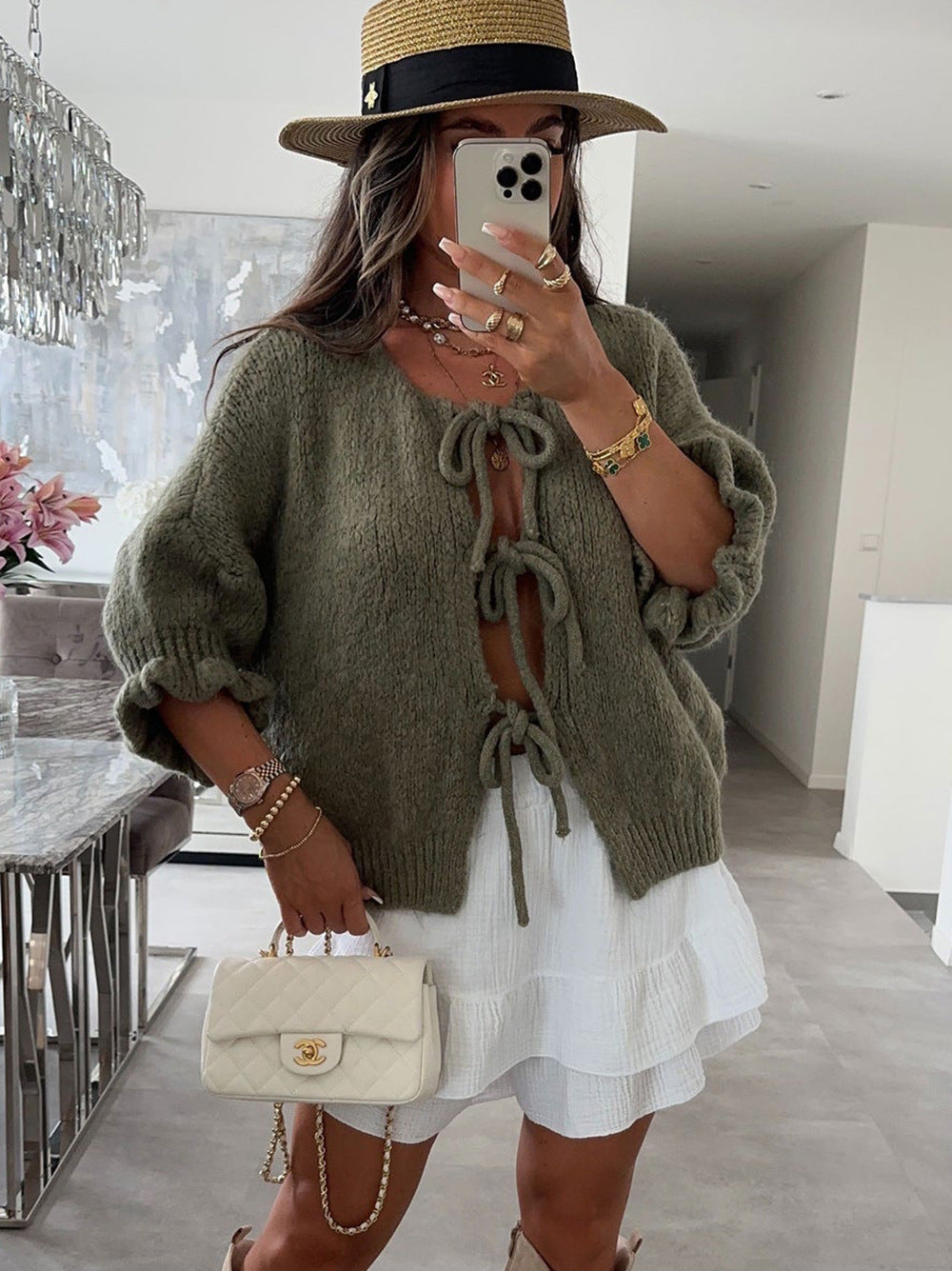 Kvinnors fashionabla cardigan med dekorativ dragsko och luftig passform Mirla-Eva Jonsson