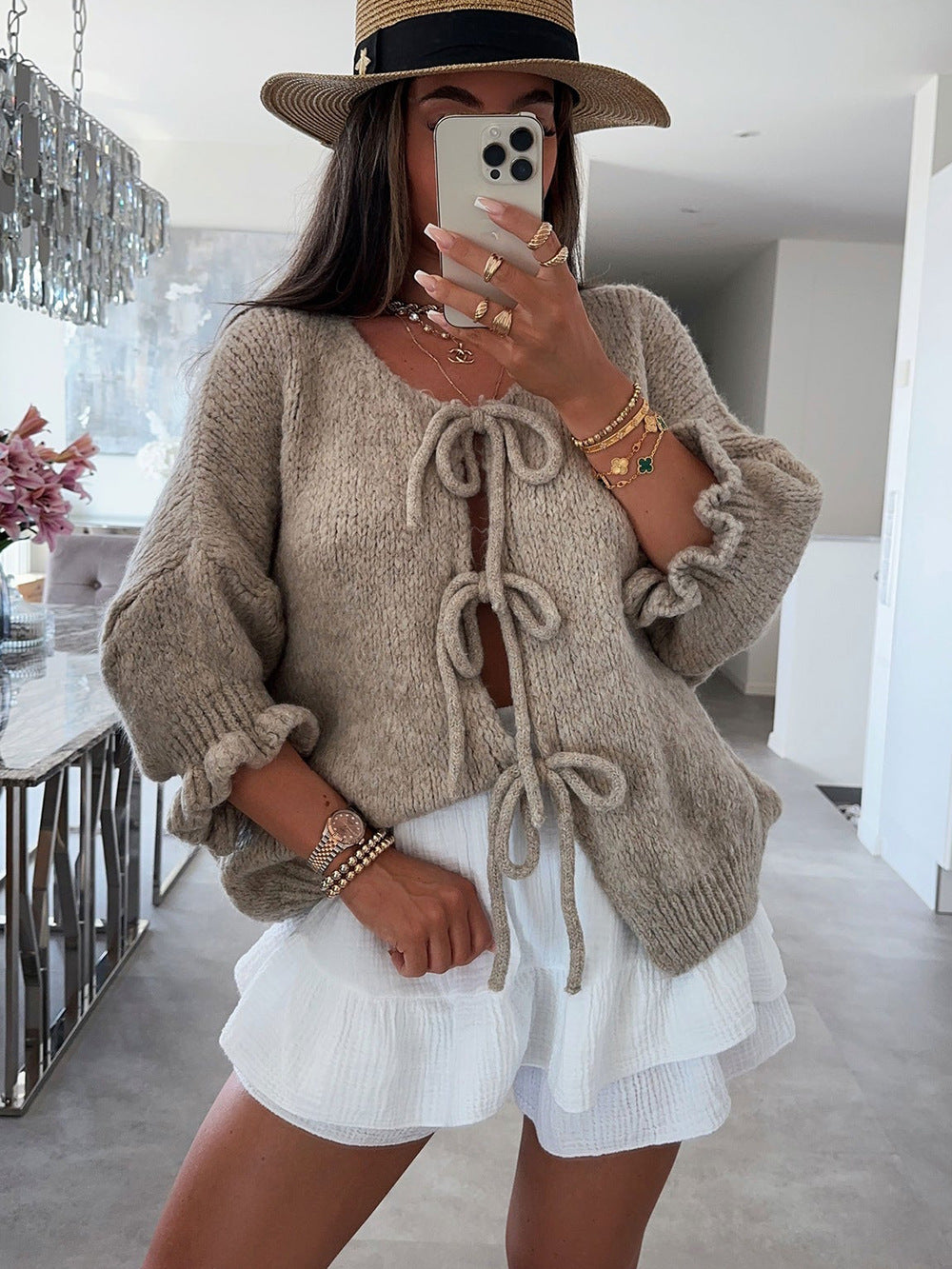 Kvinnors fashionabla cardigan med dekorativ dragsko och luftig passform Mirla-Eva Jonsson