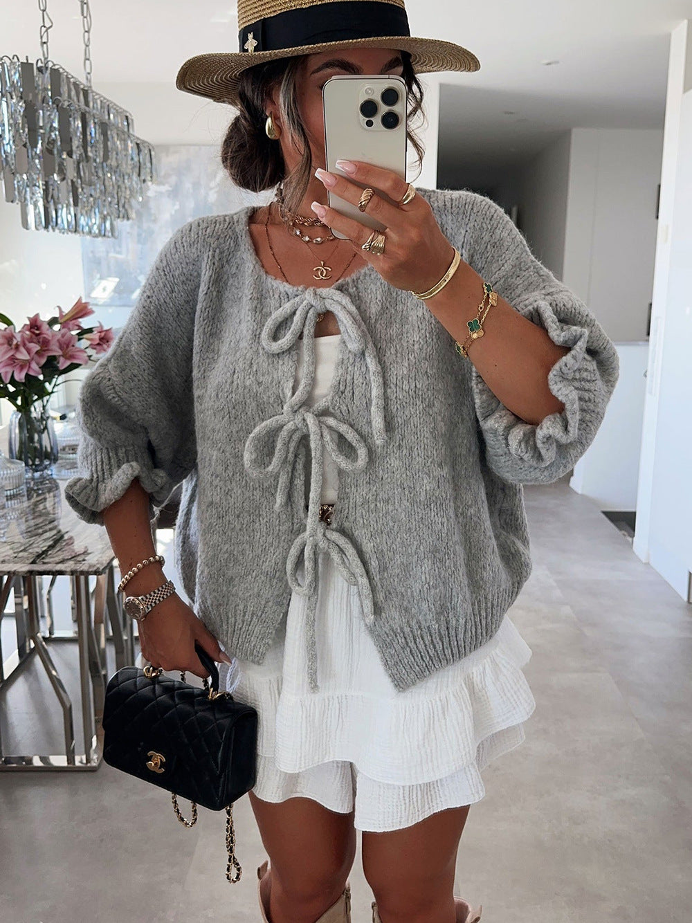 Kvinnors fashionabla cardigan med dekorativ dragsko och luftig passform Mirla-Eva Jonsson