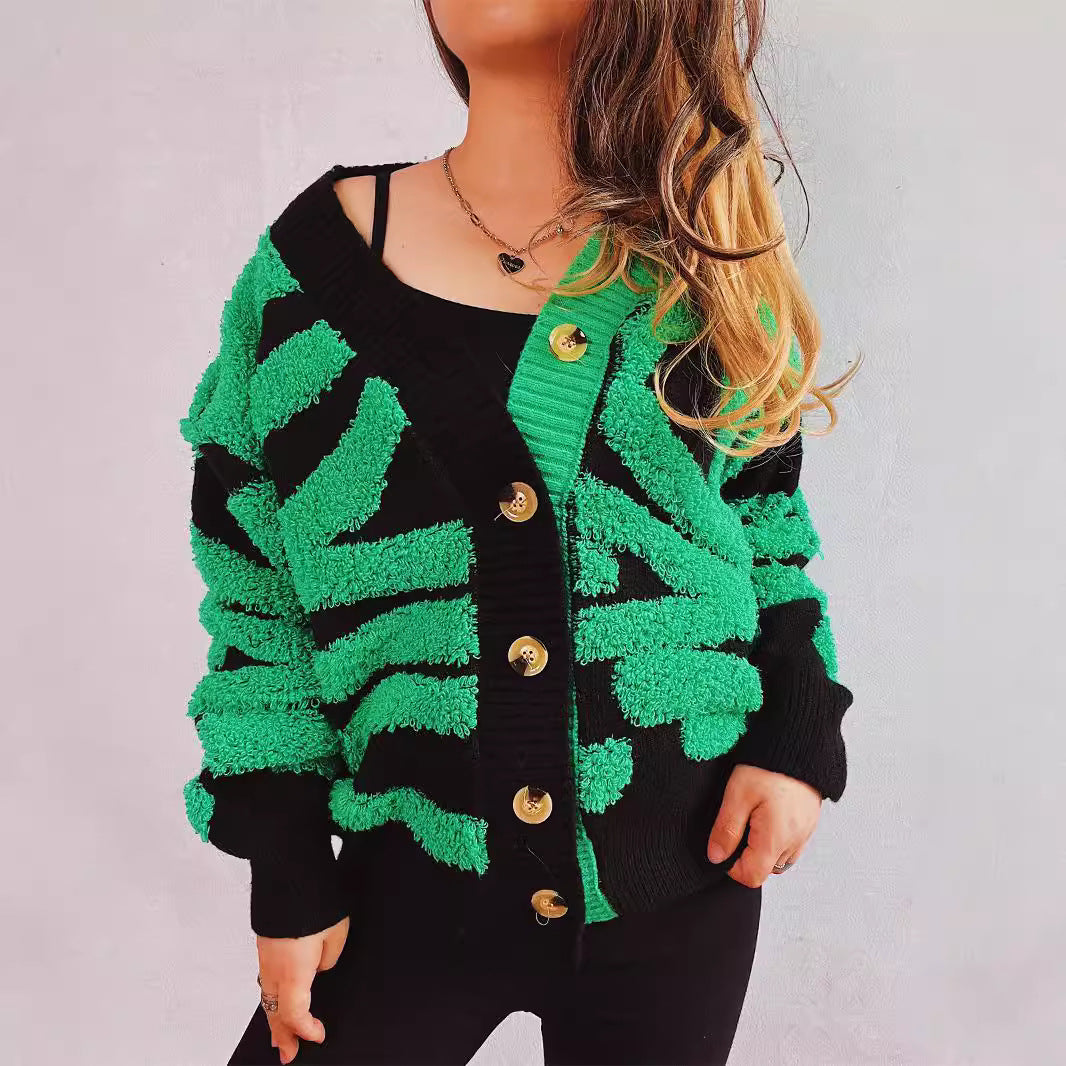 Kvinnors fashionabla cardigan med grafiskt mönster och lyxiga knappar Mirla-Eva Jonsson