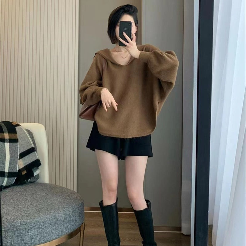 Kvinnors fashionabla hoodie med voluminösa ärmar och elegant snitt Mirla-Eva Jonsson