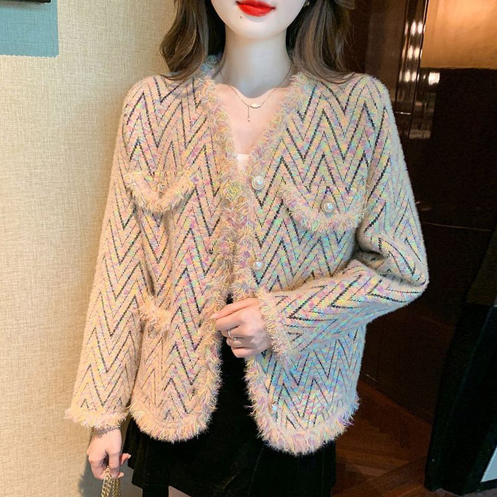 Kvinnors fashionabla kofta med chic zigzag-mönster och eleganta knappdetaljer Mirla-Eva Jonsson