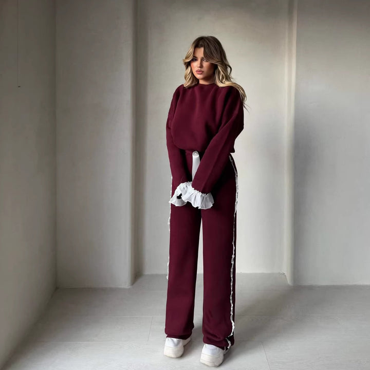 Kvinnors fashionabla lounge set med höga volangdetaljer-Eva Jonsson