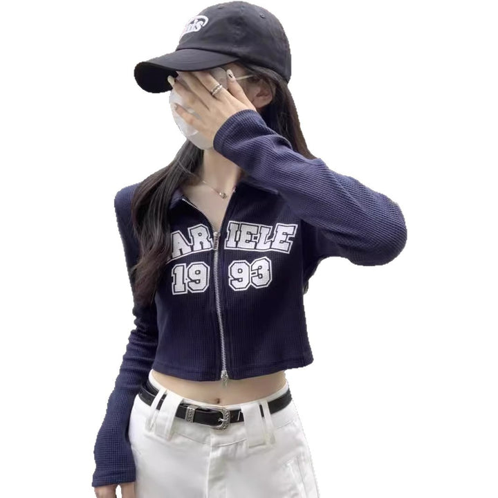 Kvinnors fashionabla och sportiga cropped skjorta med dragkedja Mirla-Eva Jonsson