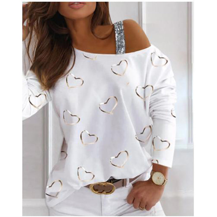 Kvinnors fashionabla sweatshirts med hjärtformad design och glittrande accenter Mirla-Eva Jonsson