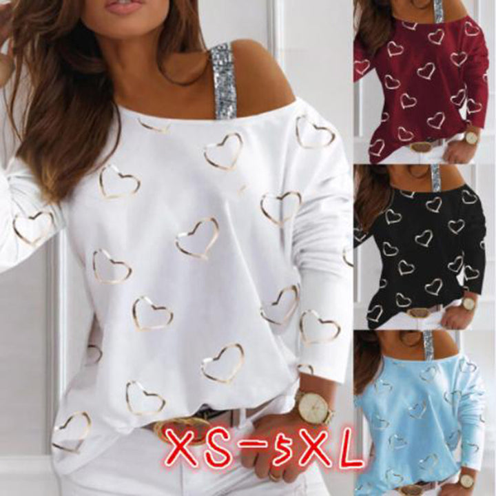 Kvinnors fashionabla sweatshirts med hjärtformad design och glittrande accenter Mirla-Eva Jonsson