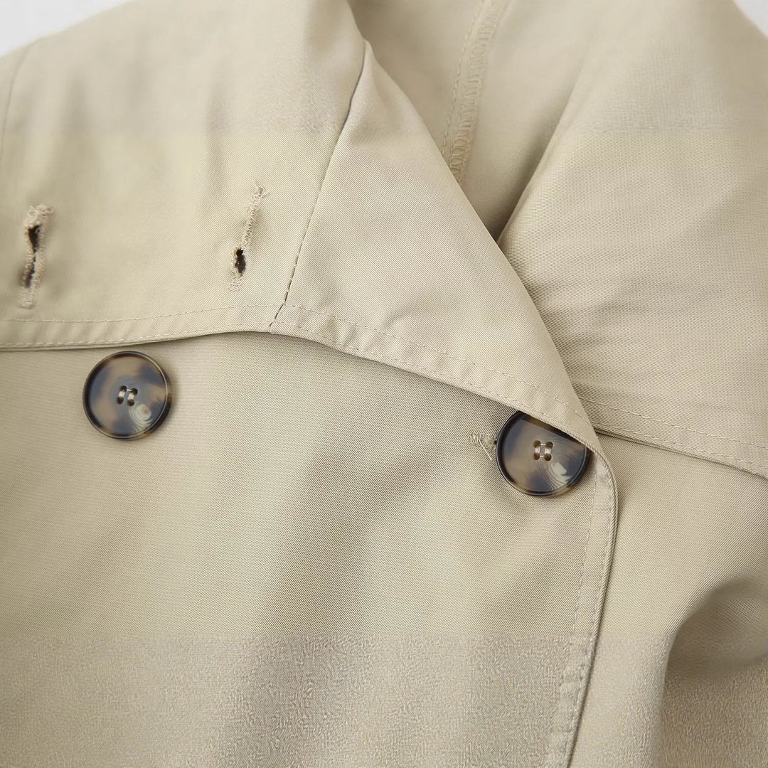 Kvinnors fashionabla trench coat jacka med bred krage och bälte detaljer Mirla-Eva Jonsson