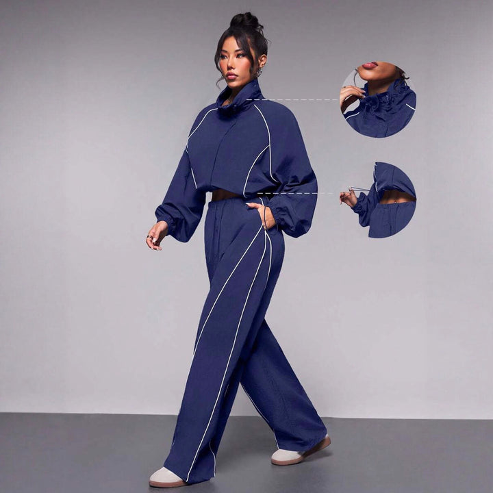 Kvinnors fashionable sportpullover med elastisk midjeband och hög krage Mirla-Eva Jonsson