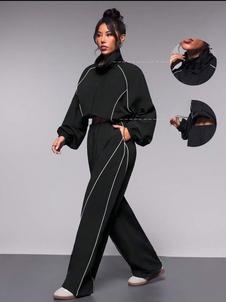 Kvinnors fashionable sportpullover med elastisk midjeband och hög krage Mirla-Eva Jonsson