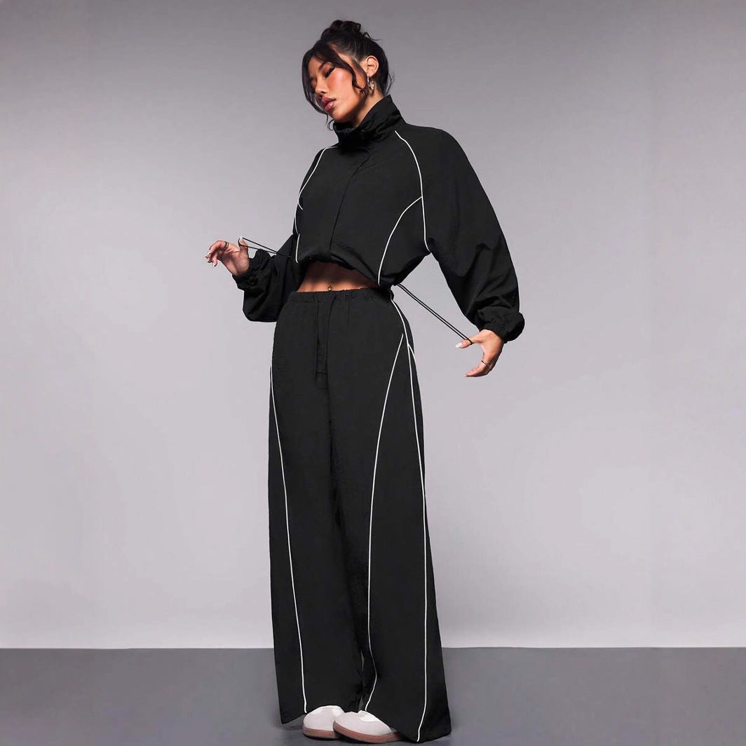 Kvinnors fashionable sportpullover med elastisk midjeband och hög krage Mirla-Eva Jonsson