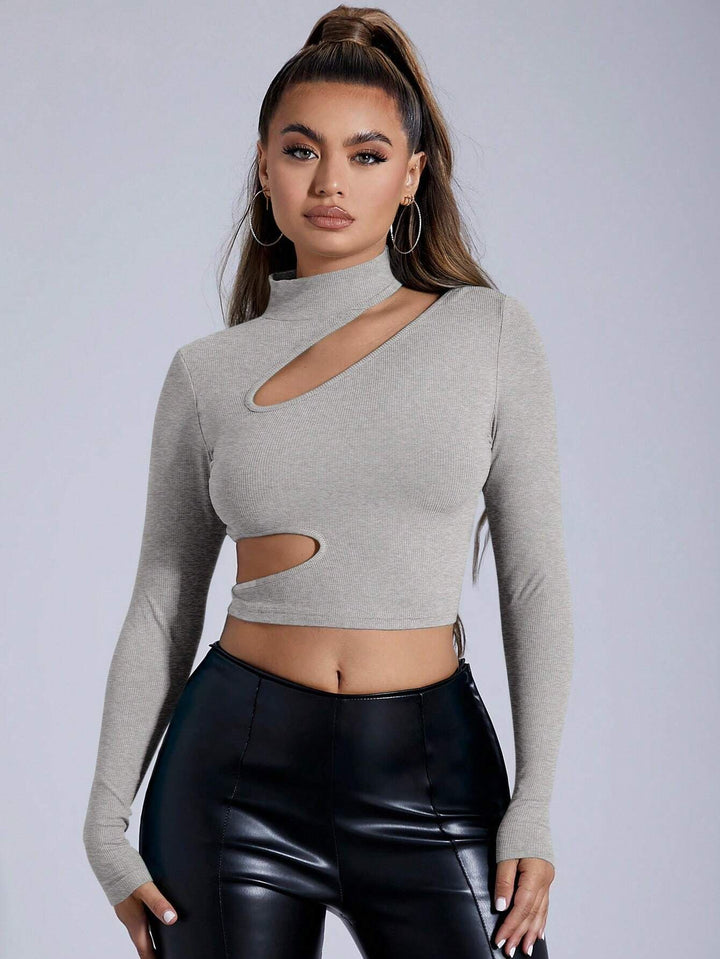 Kvinnors figurnära långärmad crop top med asymmetrisk utskärning Mirla-Eva Jonsson