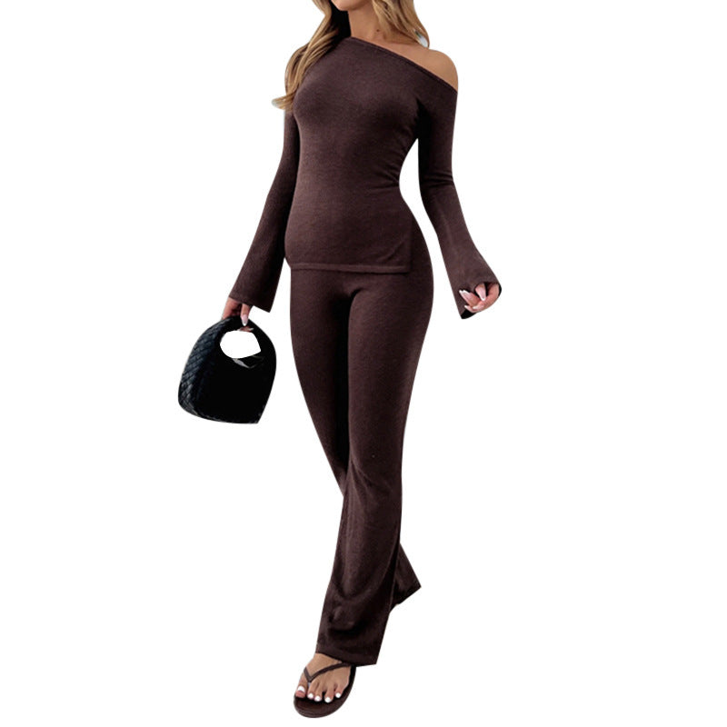 Kvinnors figurnära långärmad skjorta med off-shoulder design och utsvängda ärmar Mirla-Eva Jonsson