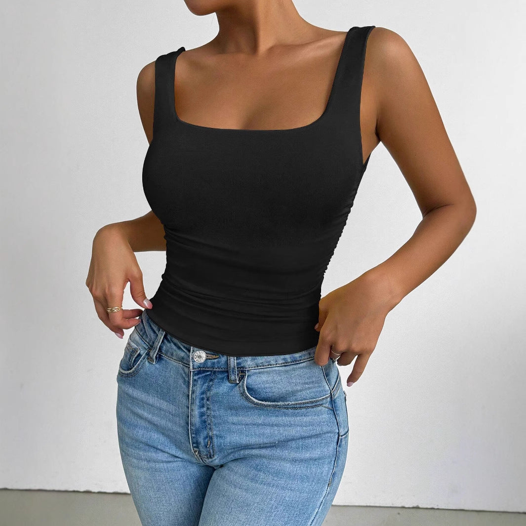 Kvinnors figurnära topp med fyrkantig neckline och volangdetaljer Mirla-Eva Jonsson