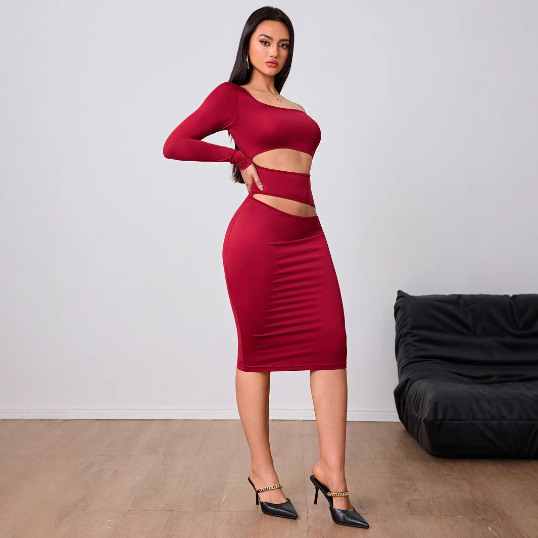 Kvinnors figursydda cut-out midi klänning med asymmetrisk design och långa ärmar Mirla-Eva Jonsson