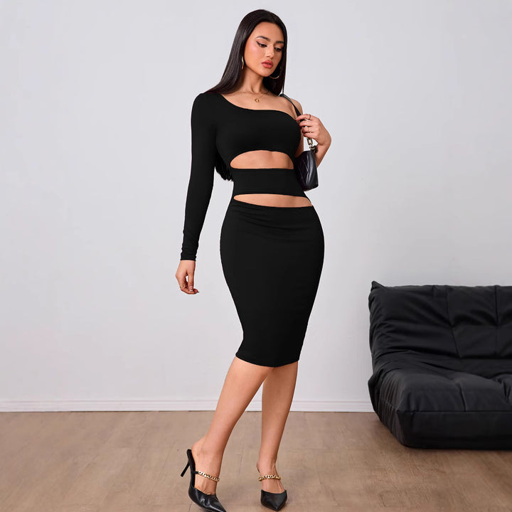 Kvinnors figursydda cut-out midi klänning med asymmetrisk design och långa ärmar Mirla-Eva Jonsson