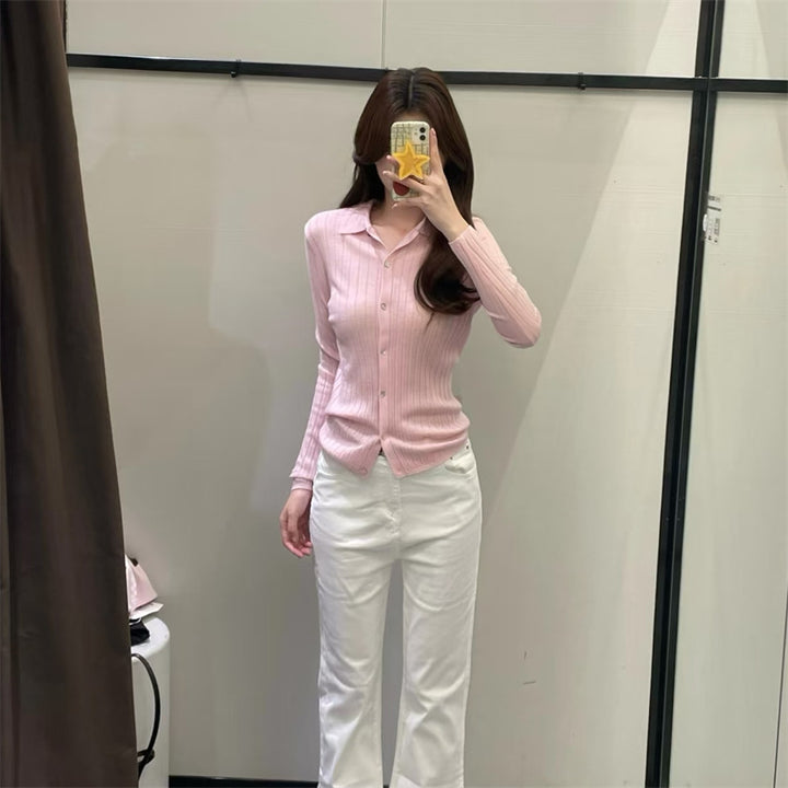 Kvinnors finstickad blus med elegant krage och knappstängning Mirla-Eva Jonsson