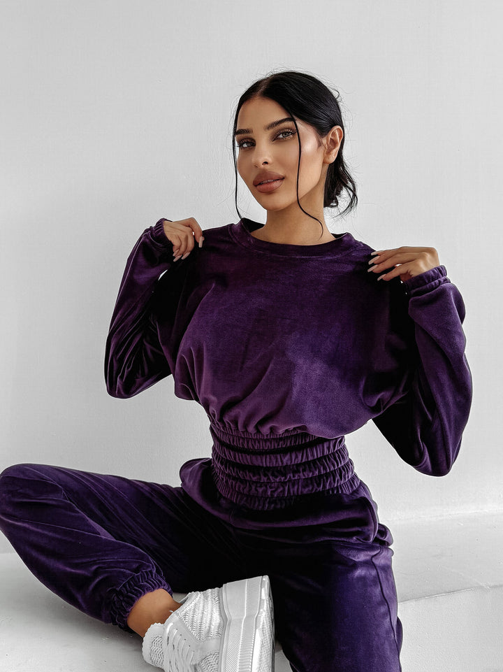 Kvinnors fleece beskuren kostym med huva och vida byxor Mirla-Eva Jonsson