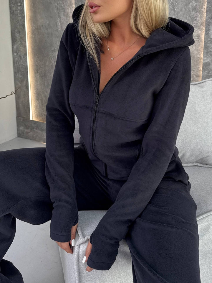 Kvinnors fleece jumpsuit med hög krage och praktiska fickor-Eva Jonsson
