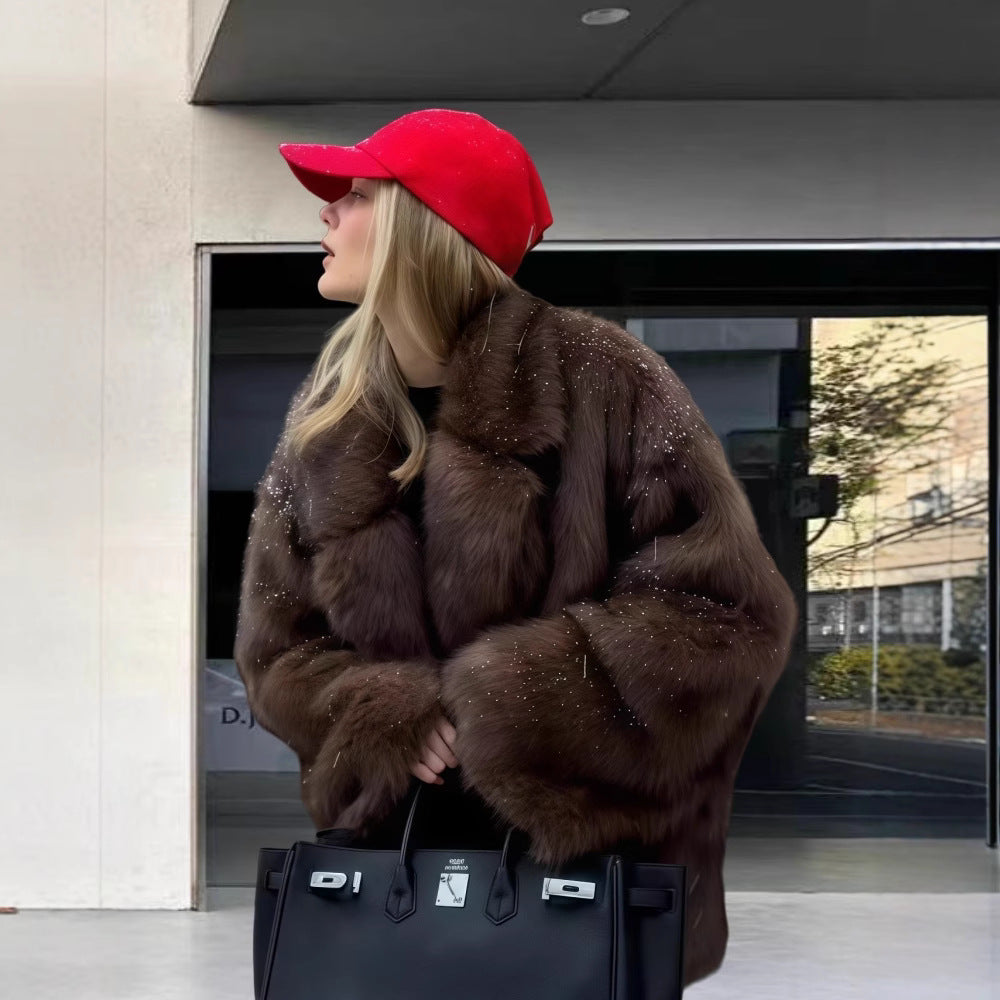 Kvinnors fleece pälsjacka med skimrande detaljer och voluminös passform-Eva Jonsson