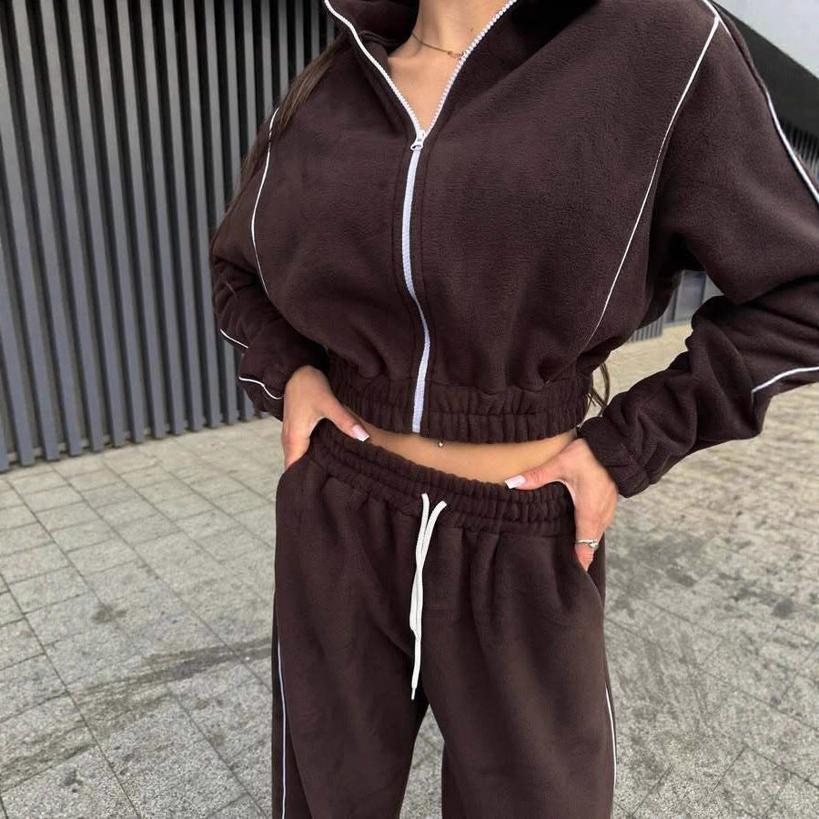 Kvinnors fleece träningsoverall med hög ställbar krage och bekväma manschetter Mirla-Eva Jonsson