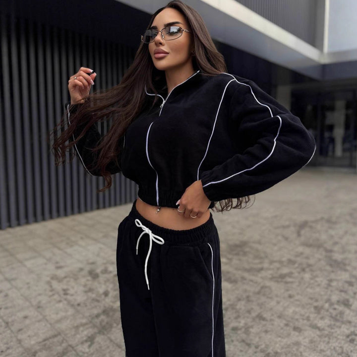 Kvinnors fleece träningsoverall med hög ställbar krage och bekväma manschetter Mirla-Eva Jonsson