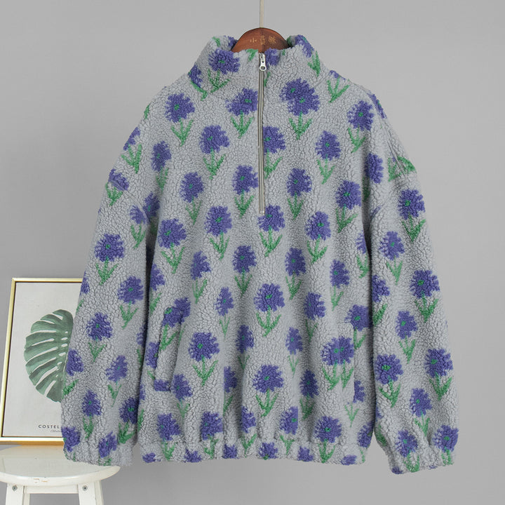 Kvinnors fleecepullover med blommönster och hög krage Mirla-Eva Jonsson