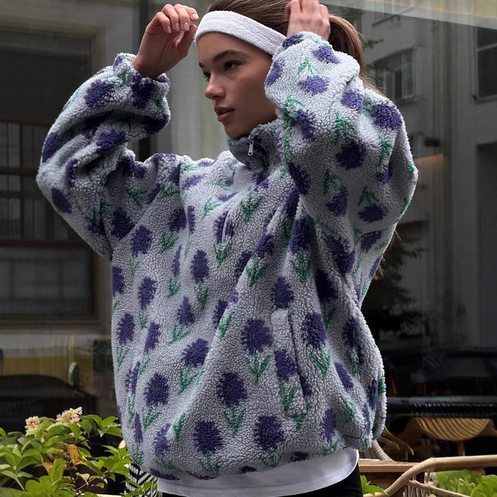 Kvinnors fleecepullover med blommönster och hög krage Mirla-Eva Jonsson