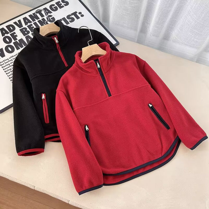 Kvinnors fleecepullover med hög krage och praktiska dragkedjefickor Mirla-Eva Jonsson
