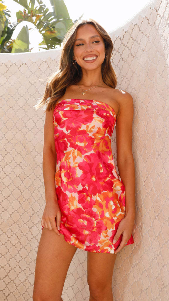 Kvinnors flirtiga minikjol i bandeau-stil med blommiga accenter och svängande nederkant-Eva Jonsson