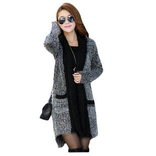 Kvinnors fluffig cardigan med praktiska fickor och avslappnad design Mirla-Eva Jonsson