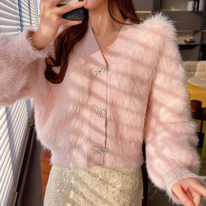 Kvinnors fluffiga cardigan med elegant knappl Decoration Mirla-Eva Jonsson