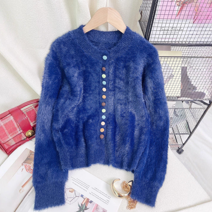Kvinnors fluffiga cardigan med färgglada knappar och vidskuren design Mirla-Eva Jonsson