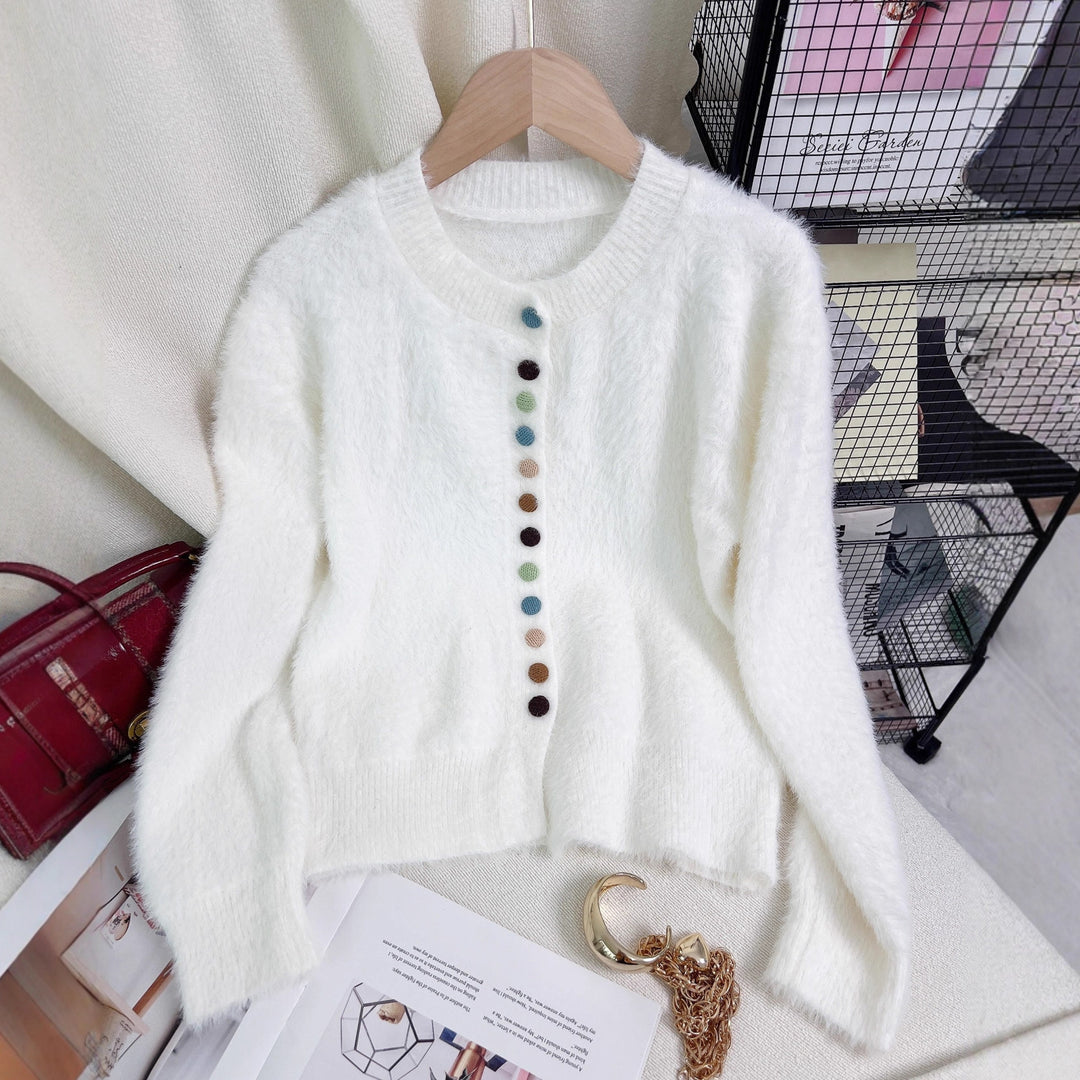 Kvinnors fluffiga cardigan med färgglada knappar och vidskuren design Mirla-Eva Jonsson